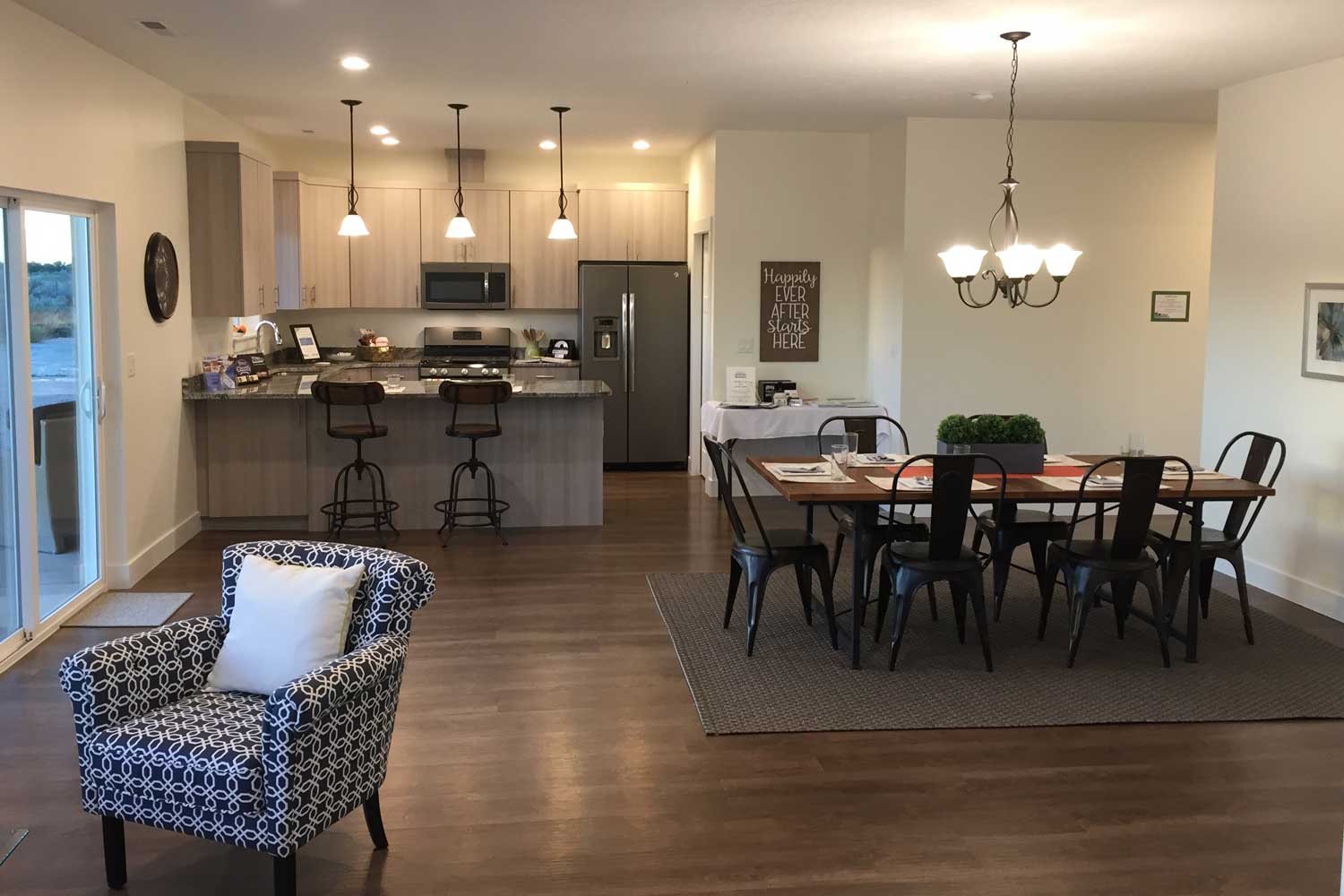 open floor plan with kitchen and dining room table