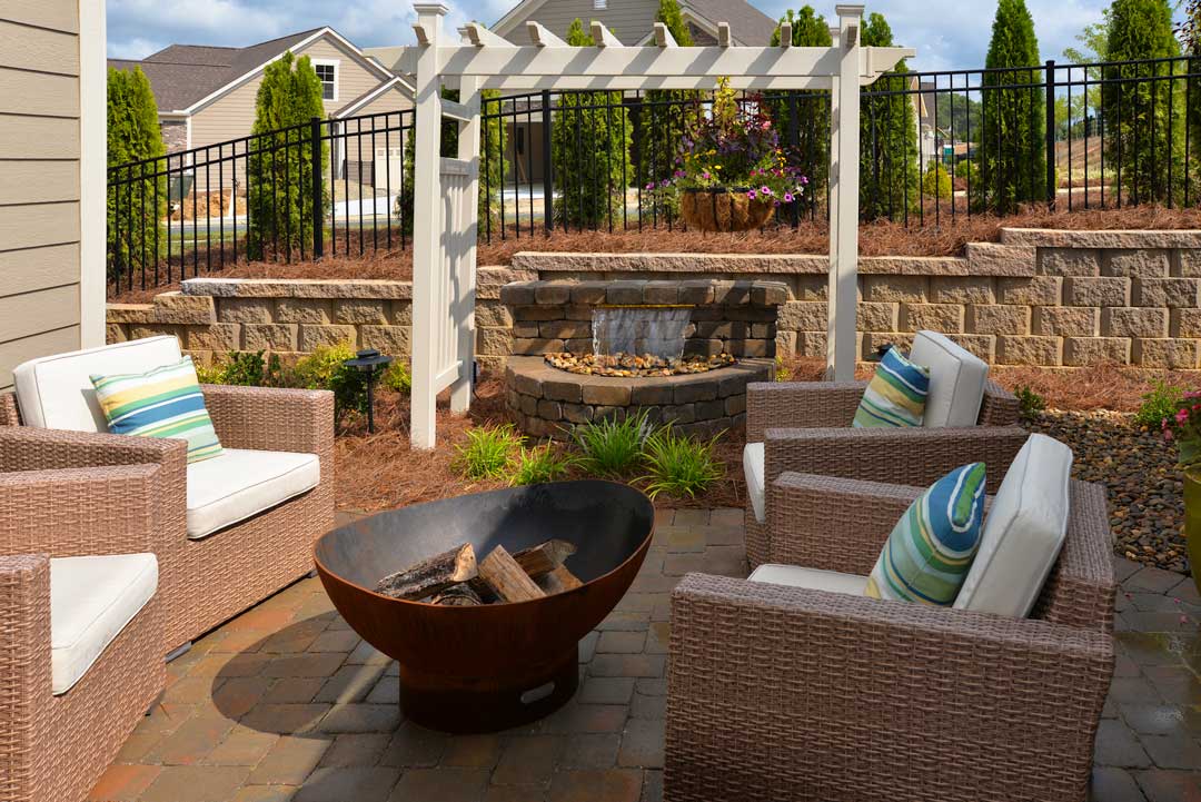 Cedar City Festival of Homes featuring outdoor living space with fire pit and water feature