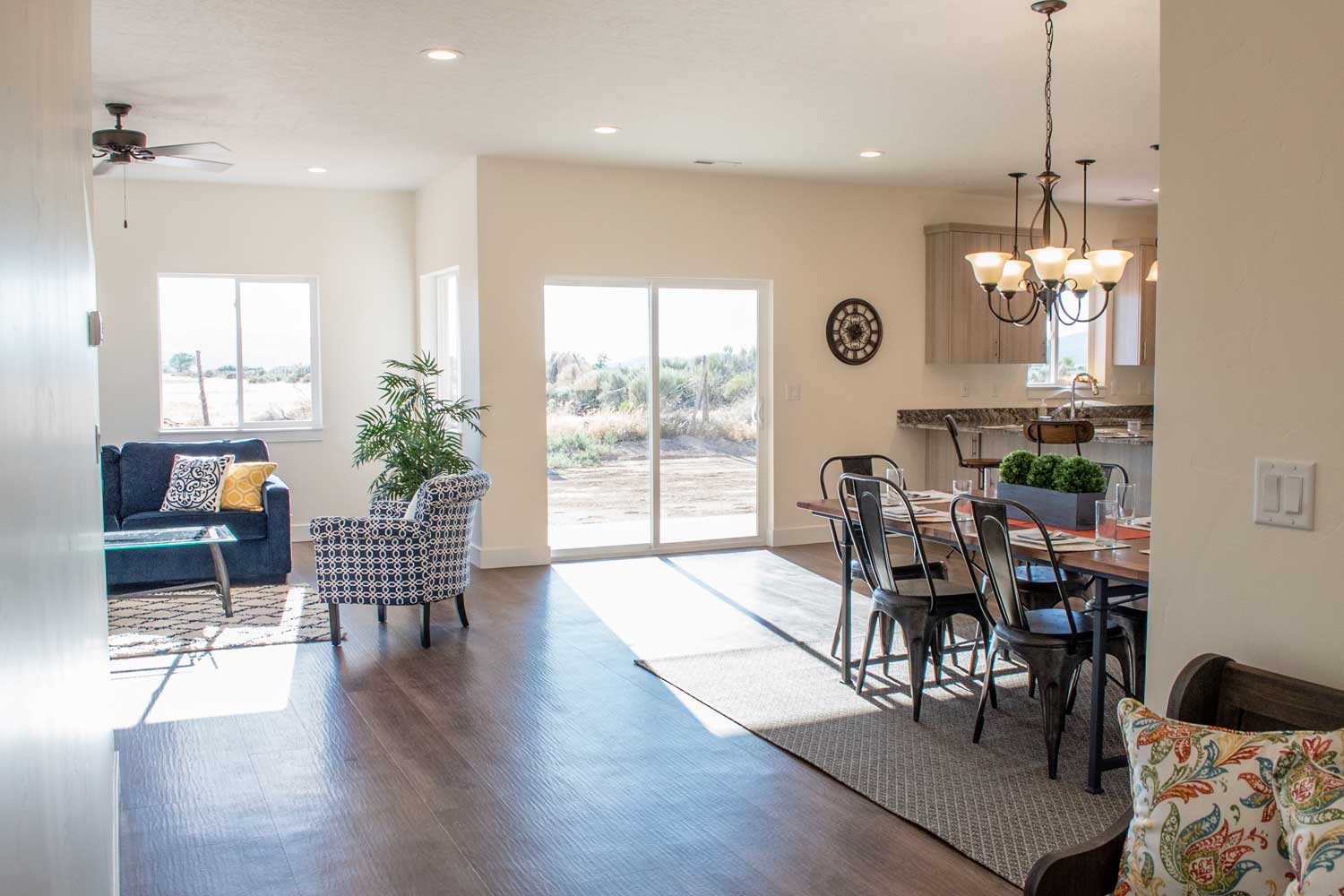 view from entry hallway with kitchen table and living room furniture in view