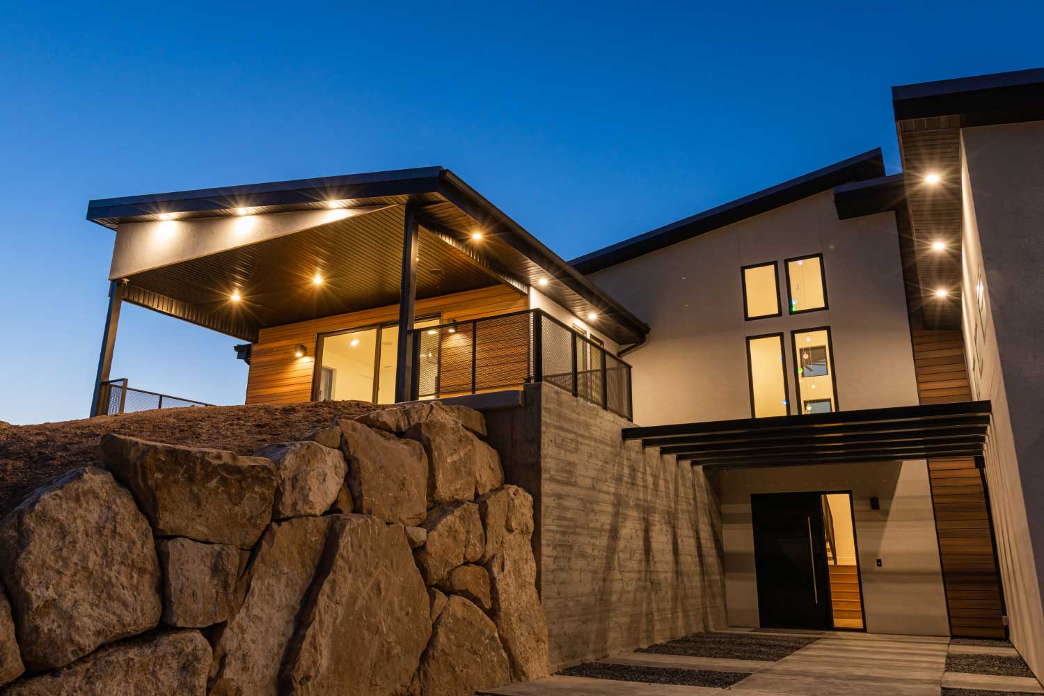 exterior night time view of custom home featured in the 2020 Festival of Homes in Cedar City