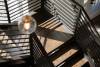 wood-stair-treads-and-black-iron-railing-custom-home.jpg