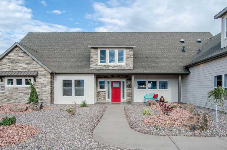 Custom home in Enoch, Utah featuring single-level living and an RV garage